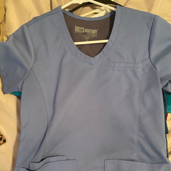 Scrub tops, jacket, and scrub bottoms. - Picture 4 of 5